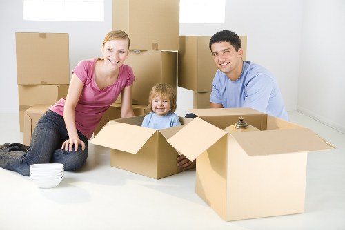 Moving van and packed boxes for Canonbury home removals