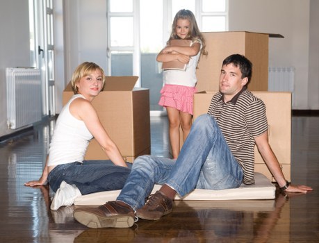 Safety-focused moving team reviewing access and load placement